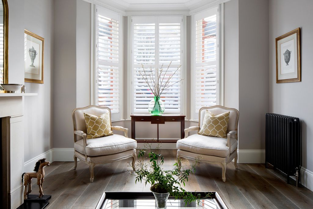 Beautiful wide full height shutters provide stylish shade and privacy in this bay window. Established in 1982 Plantation...