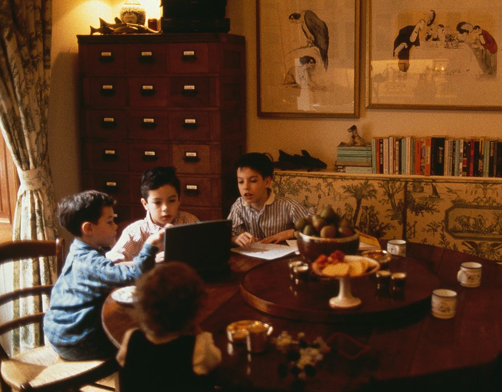 Image may contain Furniture Human Person Room Indoors Chair Living Room Couch and Table