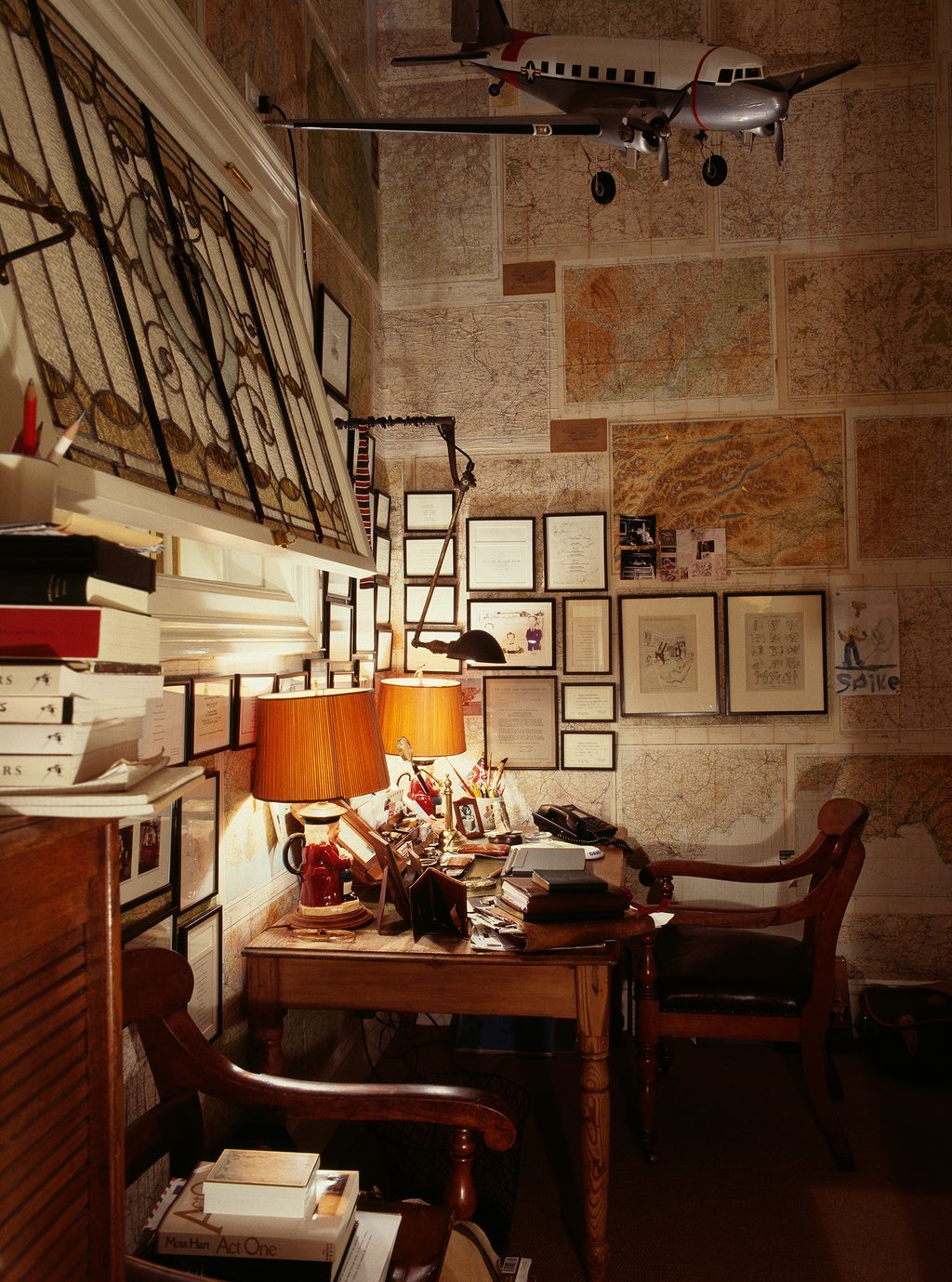 Image may contain Furniture Chair Living Room Indoors Room Wood Shelf Aircraft Airplane Vehicle and Transportation