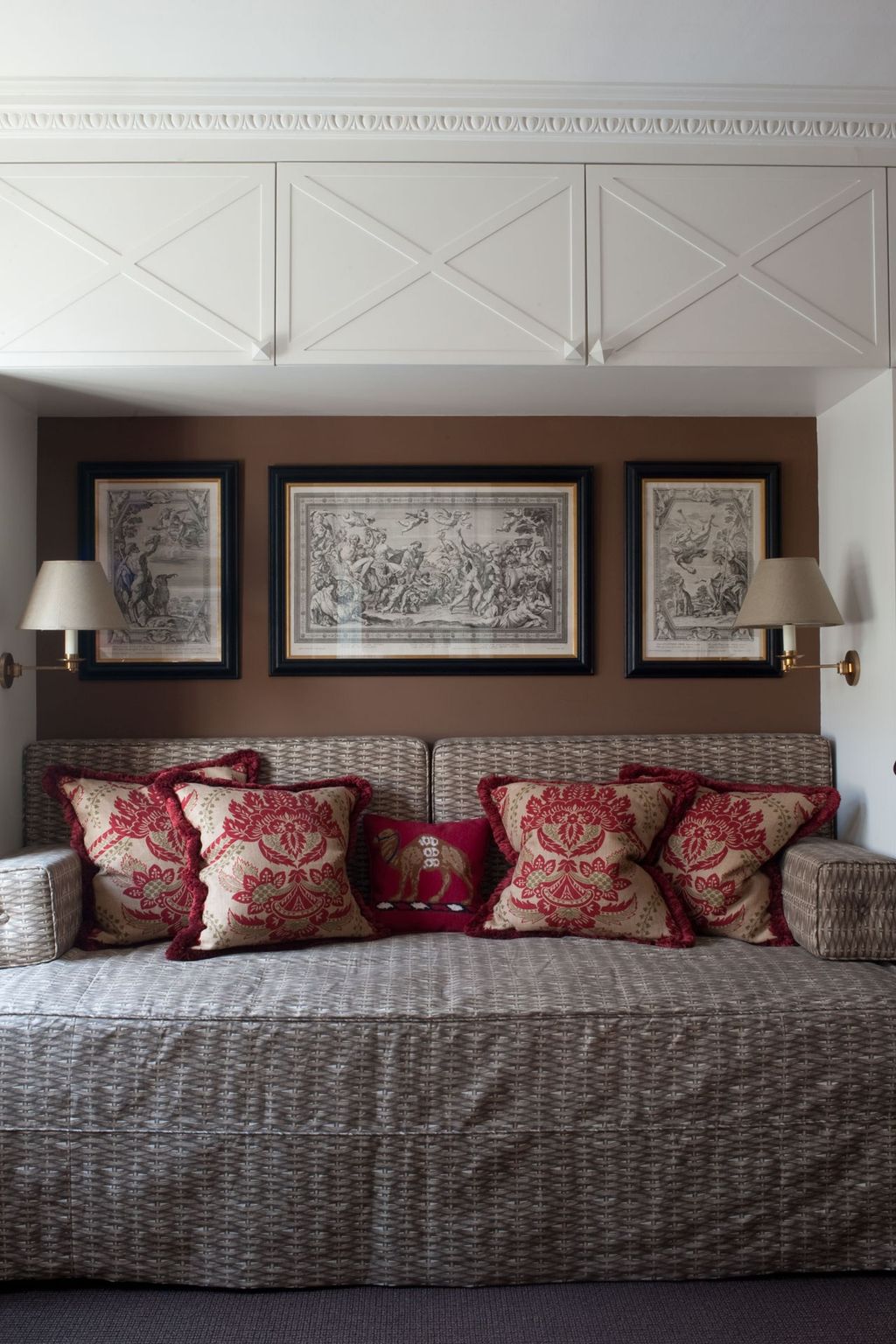 With no living space to spare overhead storage is a life saver. Paolo Moschino has created a decorative nook in this...