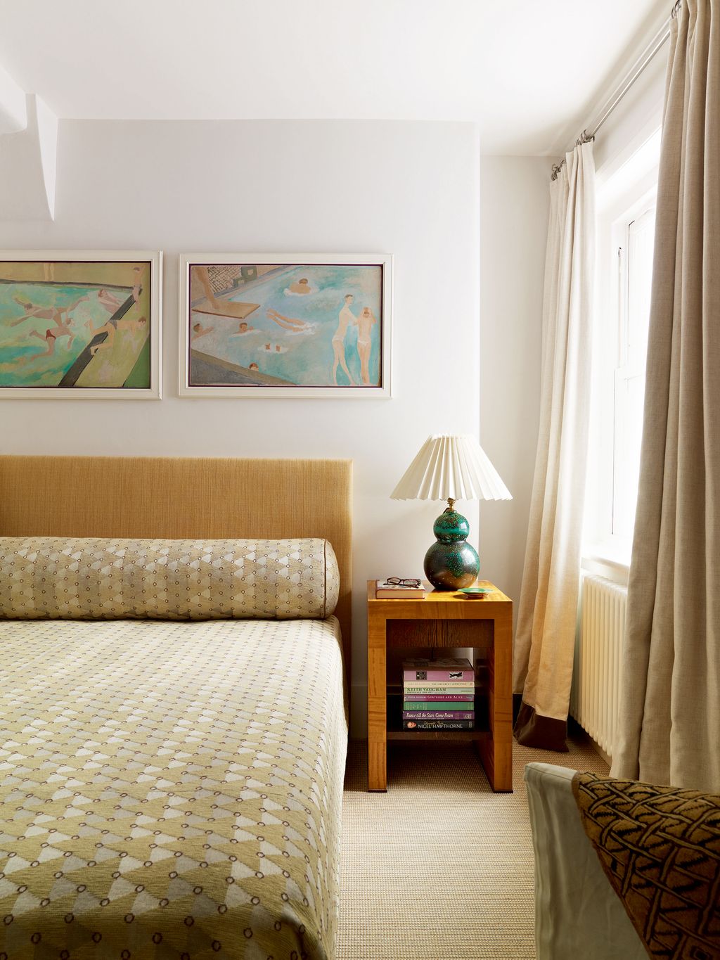 Image may contain Furniture Indoors Room Bedroom Lamp Table Lamp Interior Design and Bed