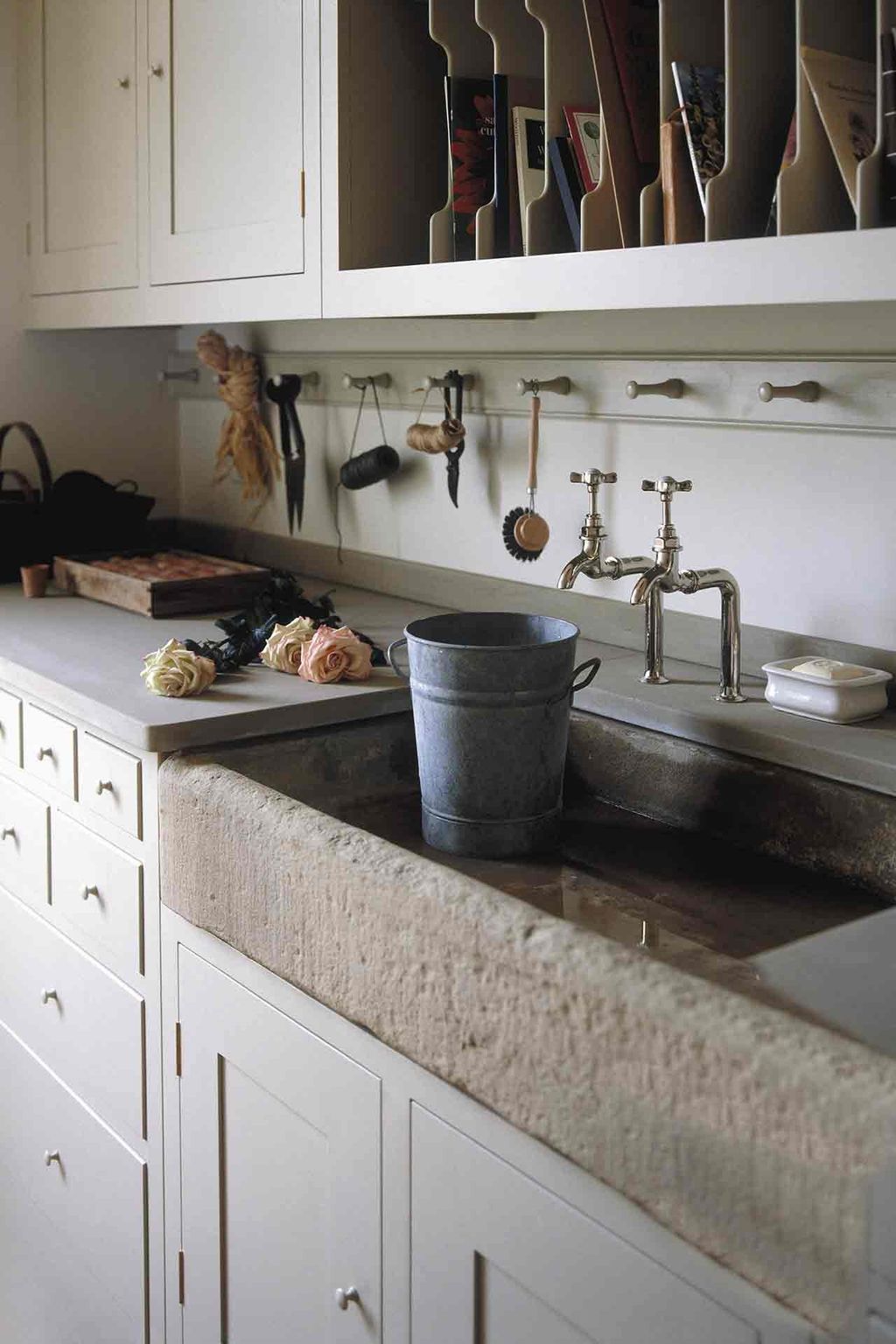 Image may contain Indoors Sink Faucet Sink and Room