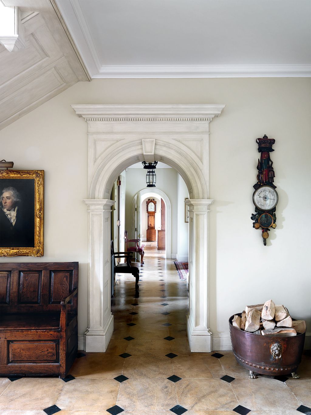 A new corridor runs from one end of the house to the other behind the dining room.