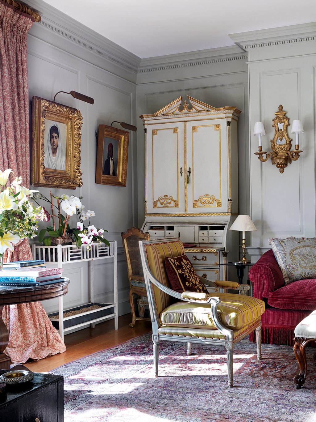 Image may contain Living Room Room Indoors Furniture Interior Design Home Decor Rug Couch and Chair