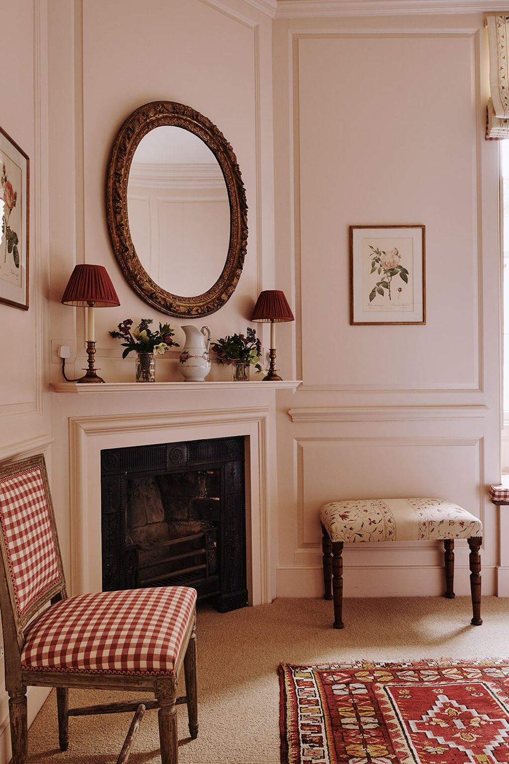 Image may contain Furniture Chair Indoors Interior Design Living Room Room Fireplace Hearth Rug and Home Decor