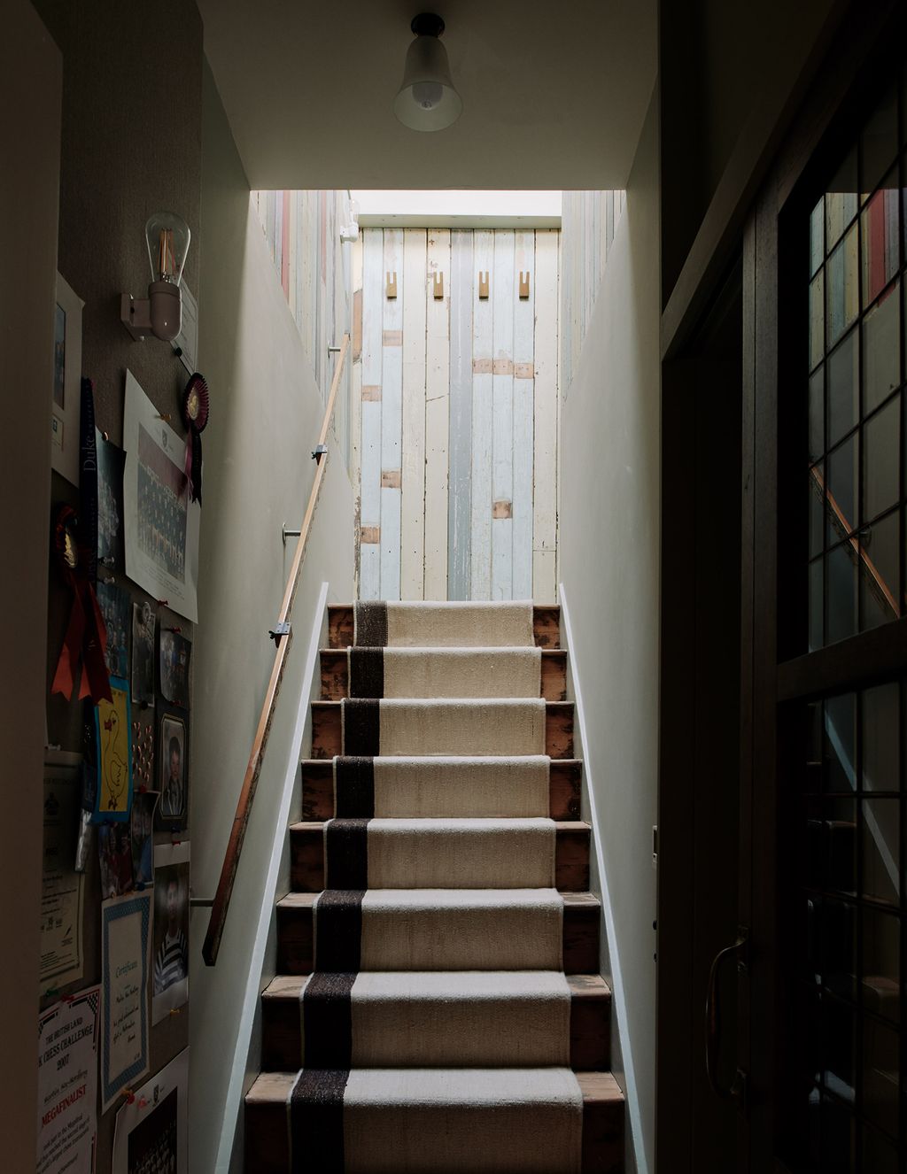 Image may contain Banister Handrail Wood Staircase Interior Design Indoors and Hardwood