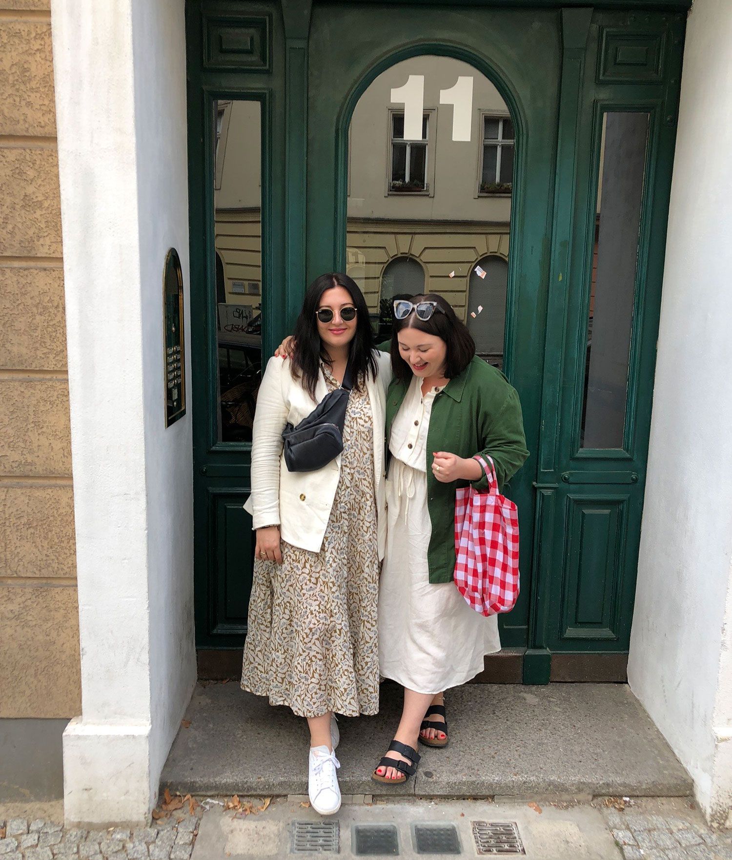 Image may contain Clothing Apparel Human Person Sleeve Home Decor Coat Door Long Sleeve and Overcoat