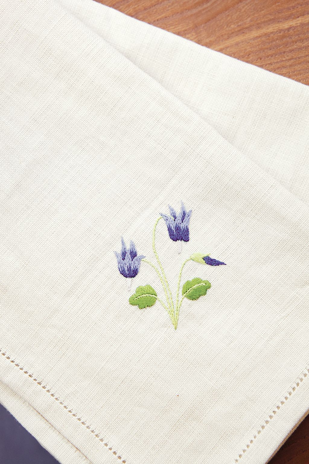 Image may contain Pattern Embroidery Rug and Stitch