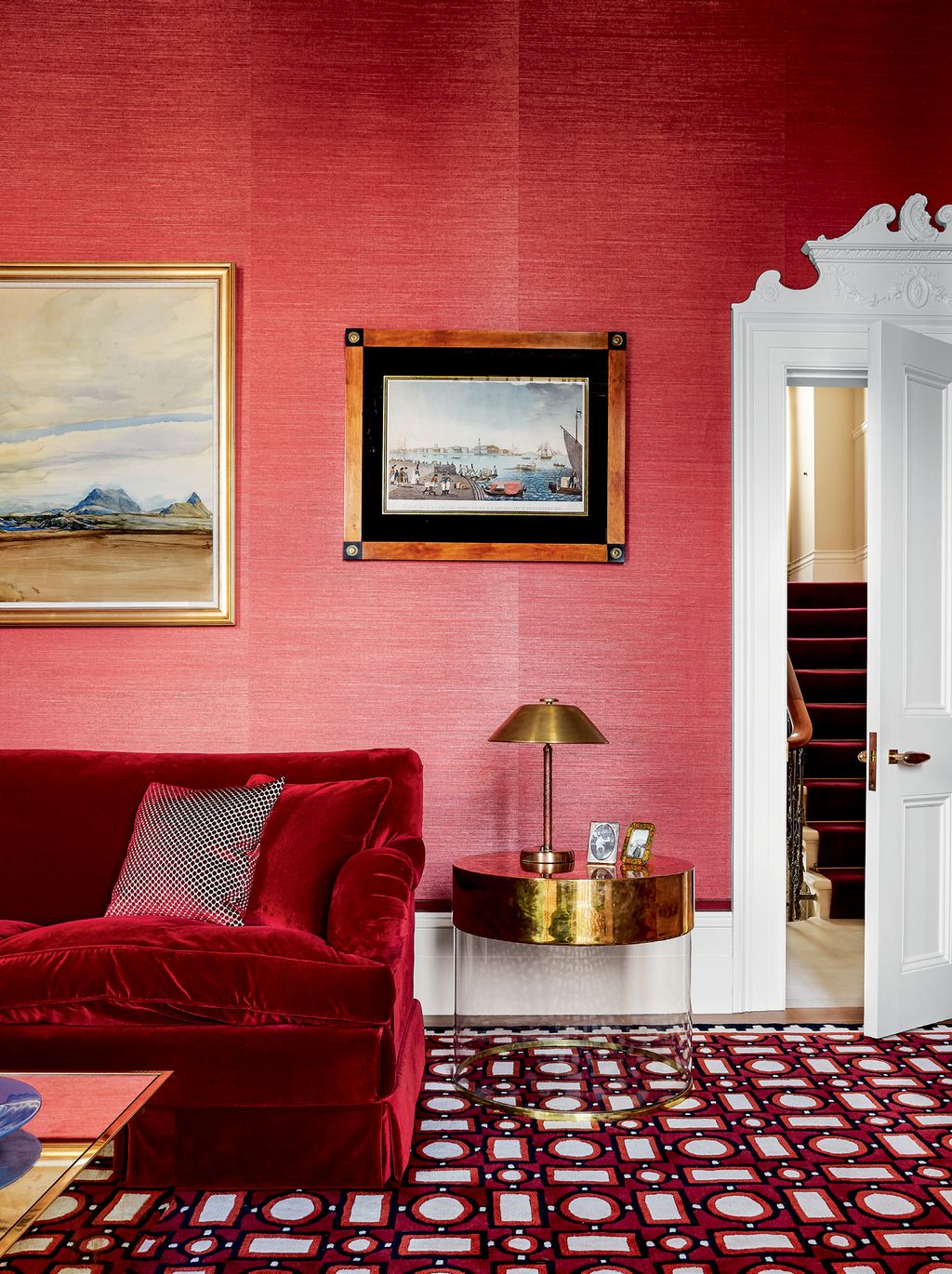 Image may contain Furniture Rug Living Room Indoors Room and Couch