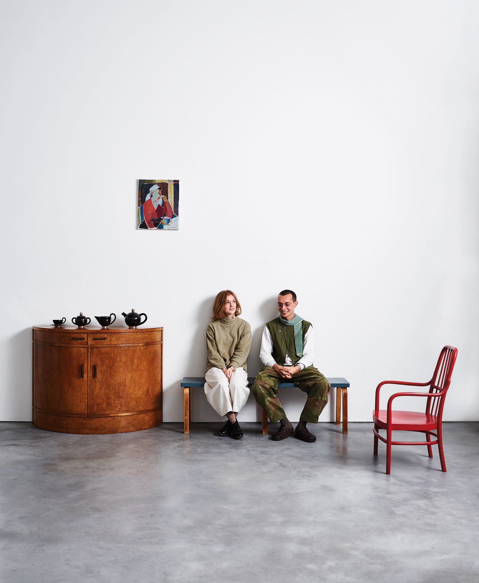 Image may contain Furniture Human Person Chair Flooring Sitting Home Decor and Floor