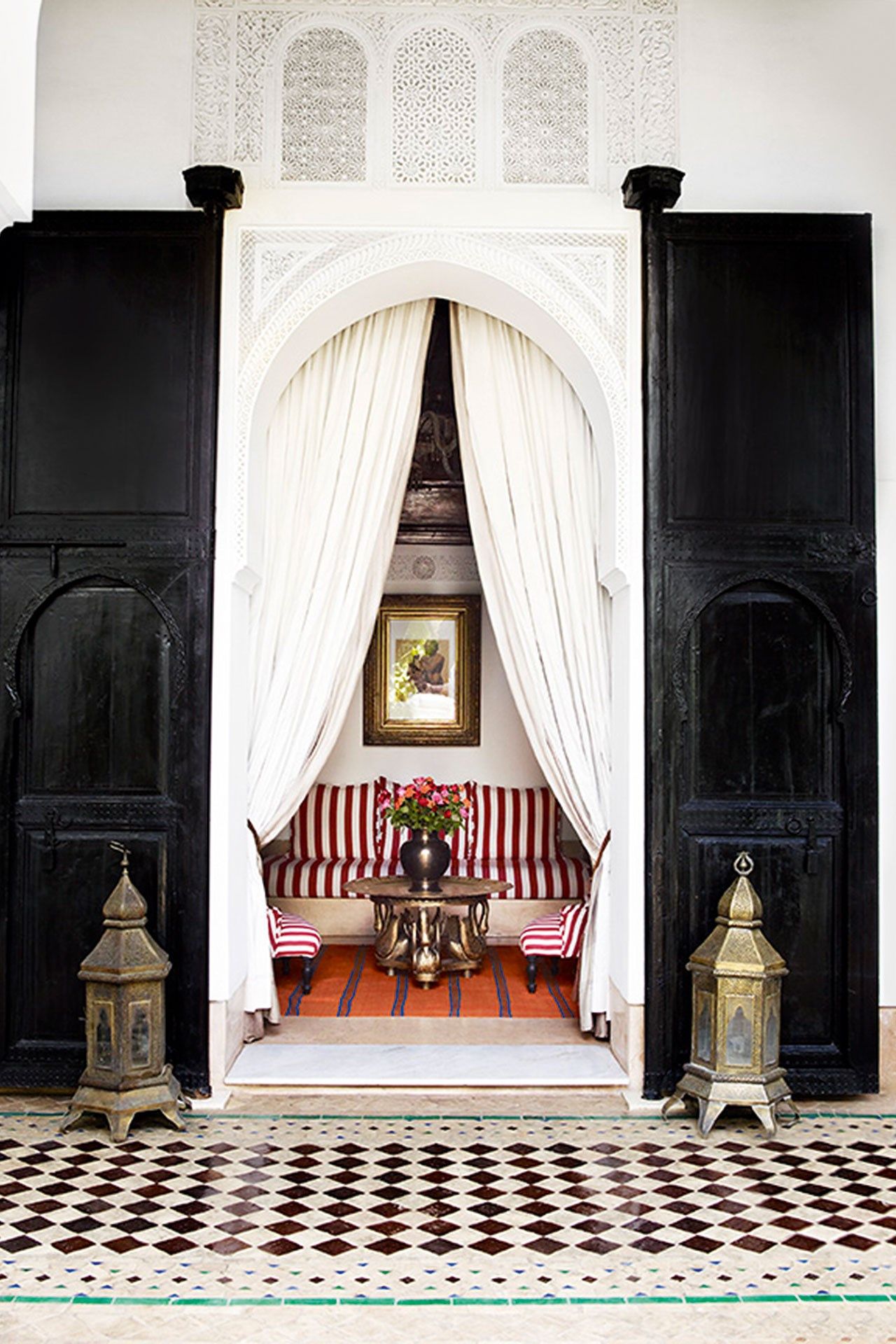 Image may contain Furniture Rug Housing Mansion House Building Throne and Home Decor