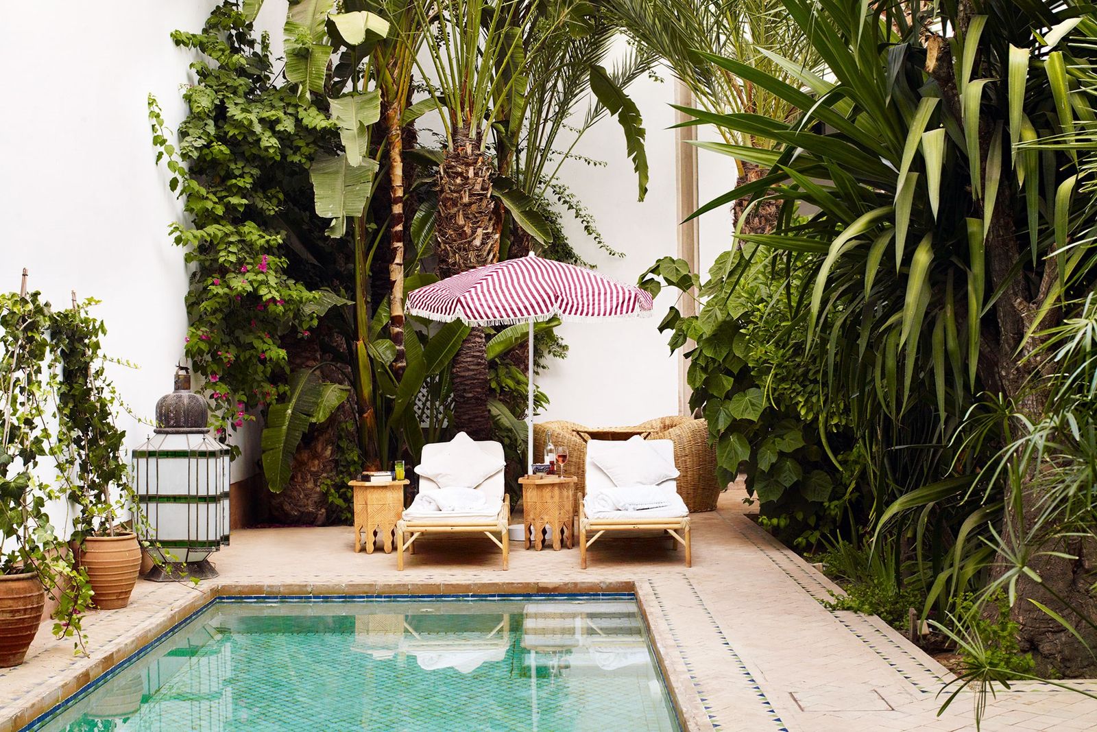 Image may contain Pool Water Outdoors Patio Flagstone Garden and Building