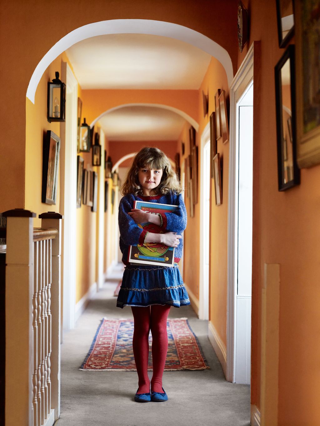 Image may contain Corridor Flooring Human Person Skirt Clothing Apparel Floor Shoe and Footwear