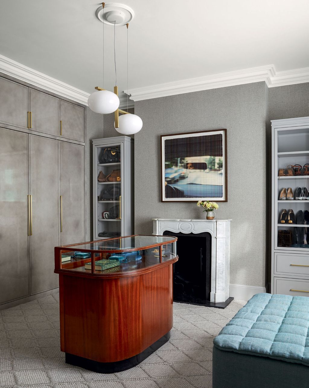 Image may contain Furniture Interior Design Indoors Living Room Room Shelf Table and Flooring