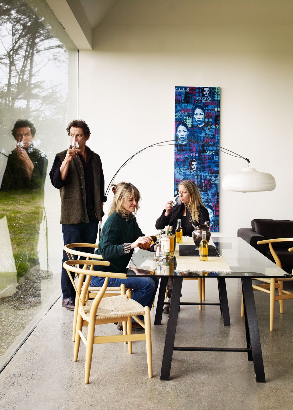 Image may contain Furniture Chair Restaurant Human Person Sitting Table Footwear Clothing Shoe Apparel and Cafe