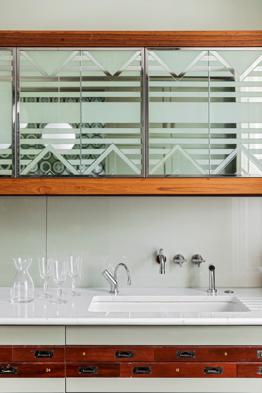 Image may contain Shelf Furniture Indoors Interior Design and Sink Faucet