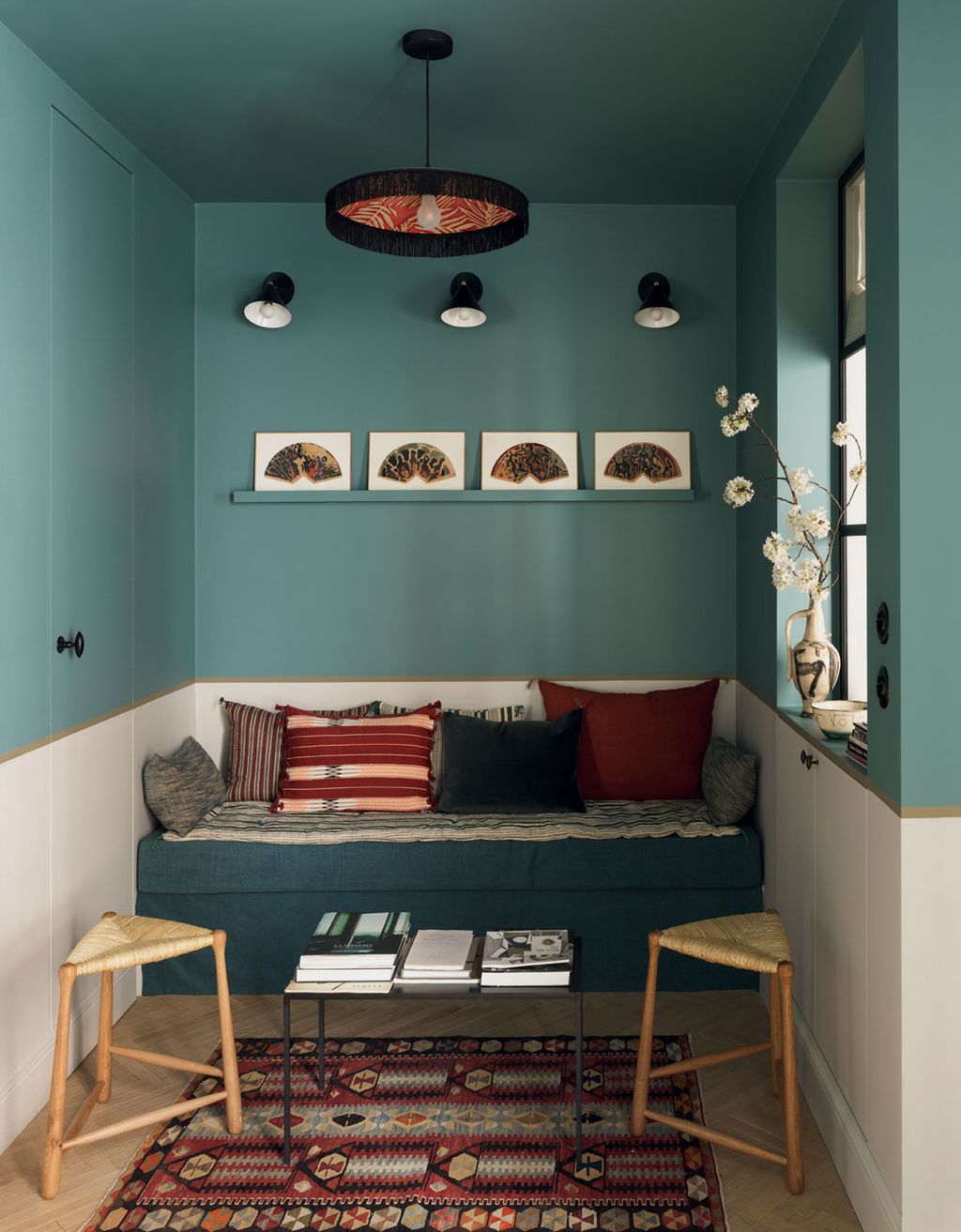 Image may contain Furniture Indoors Room Living Room Rug and Bedroom