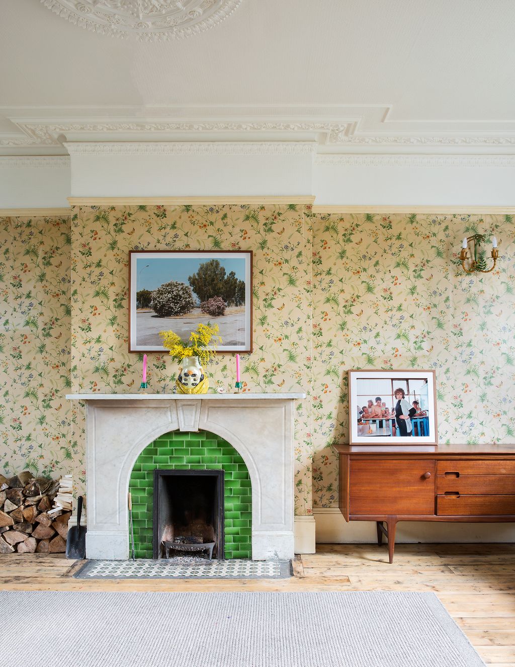 Image may contain Fireplace Indoors Hearth Human Person and Furniture