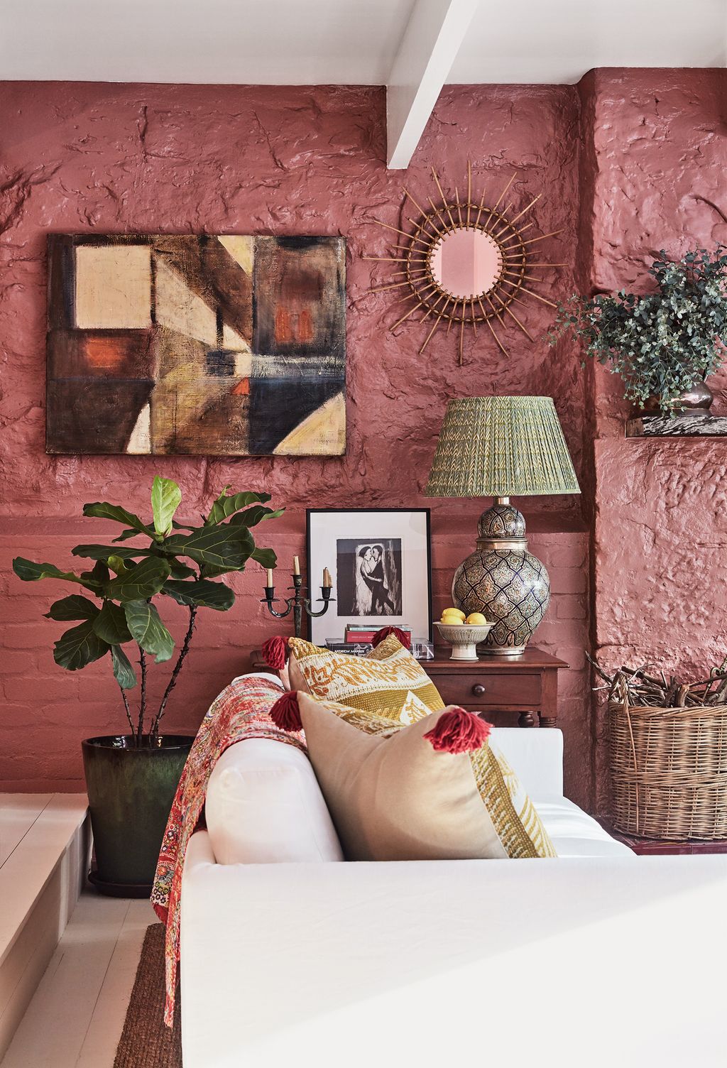 Image may contain Living Room Room Indoors Furniture Couch Interior Design Lamp Table Lamp and Plant