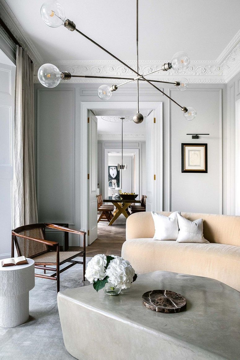 Image may contain: Furniture, Living Room, Room, Indoors, Table, Interior Design, Rug, and Couch