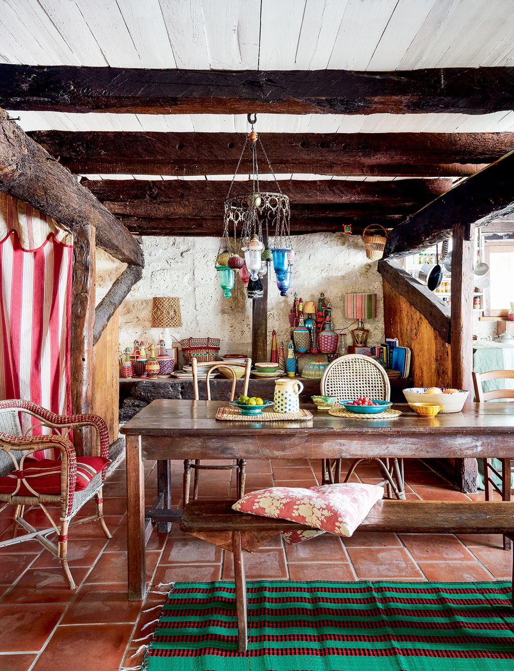 Image may contain Wood Furniture Chair Hardwood Flooring Floor Indoors Room Plywood Rug Dining Table and Table