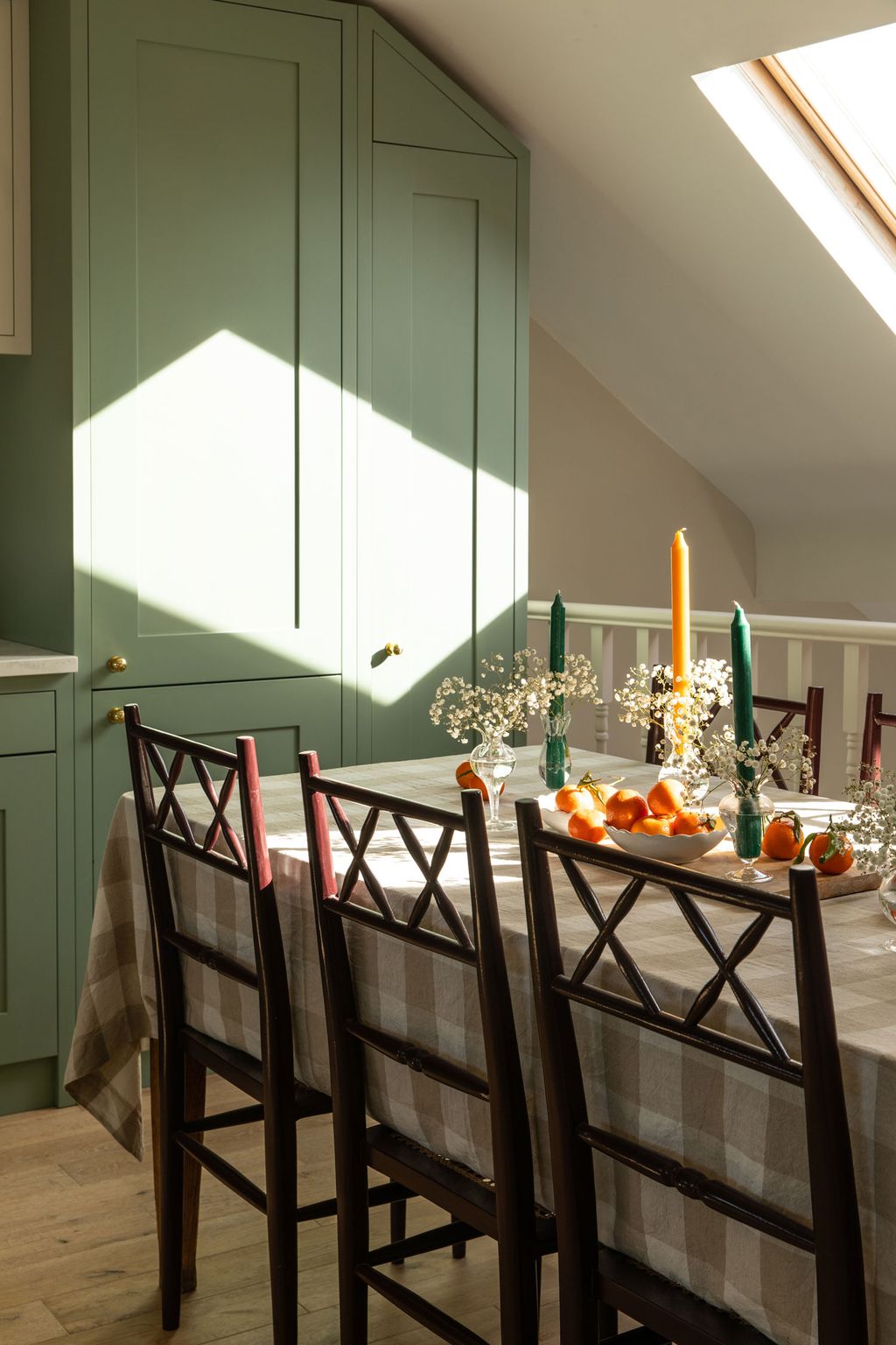 Image may contain Plant Home Decor Furniture Dining Table Table Wood Indoors Interior Design Banister and Handrail