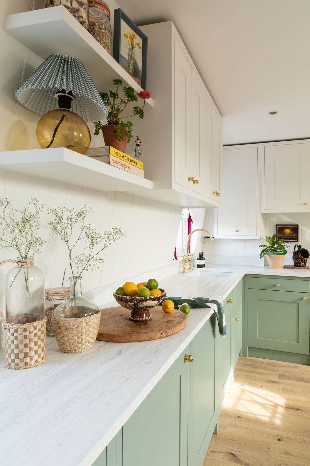 Upstairs the kitchen is on a mezzanine overlooking the living space. Emma designed it herself and had a local carpenter...