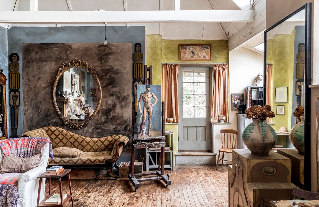 Image may contain Flooring Living Room Room Indoors Wood Floor Hardwood Furniture Couch Housing and Building