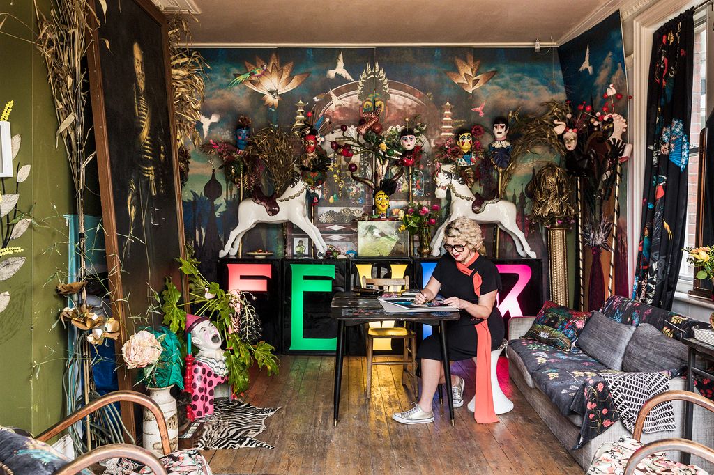 Sarah working on collagebased wallpaper and fabric patterns which draw on the exoticism of the Royal Pavilion in her...