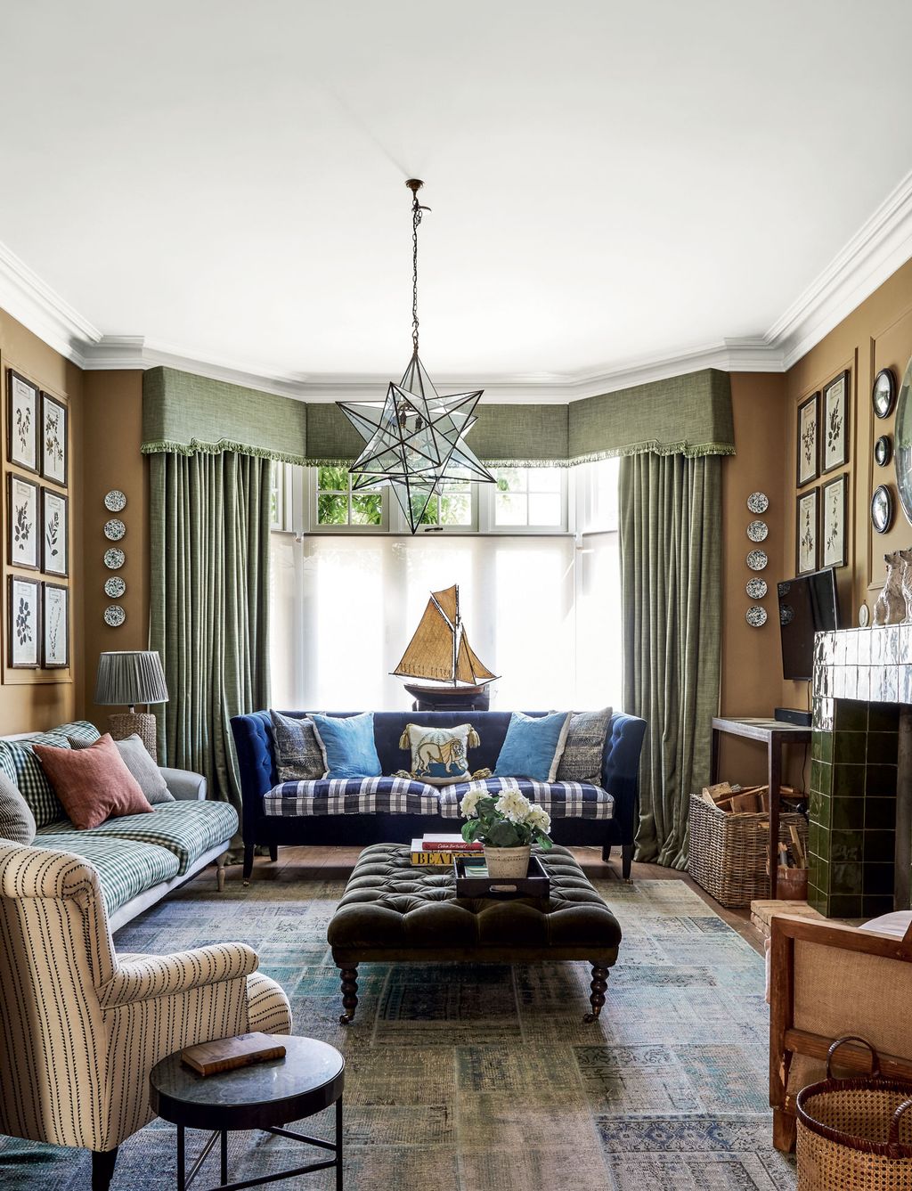 Image may contain Living Room Room Indoors Furniture Couch Interior Design Table Cushion and Pillow