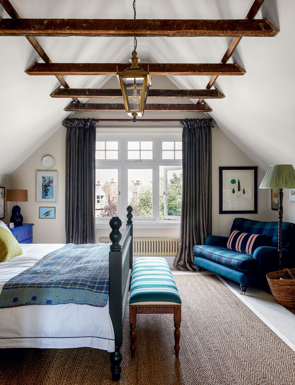 Image may contain Indoors Interior Design Room Bedroom Furniture Living Room Housing Building and Bed