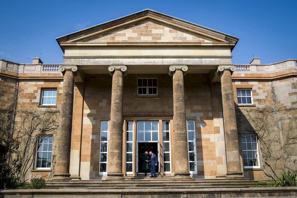 Image may contain Human Person Architecture Building Column Pillar and Window