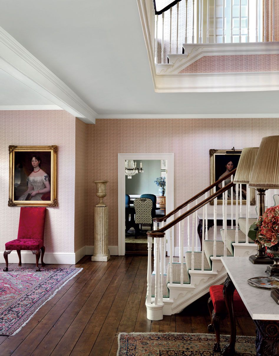Robert Kimes ‘Basilica wallpaper serves as a backdrop in this impressive hallway in a project by Henriette von...