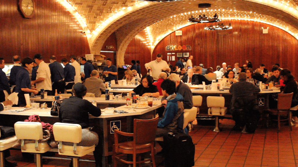 Image may contain Restaurant Food Court Food Furniture Chair Human Person Cafeteria Cafe and Sitting