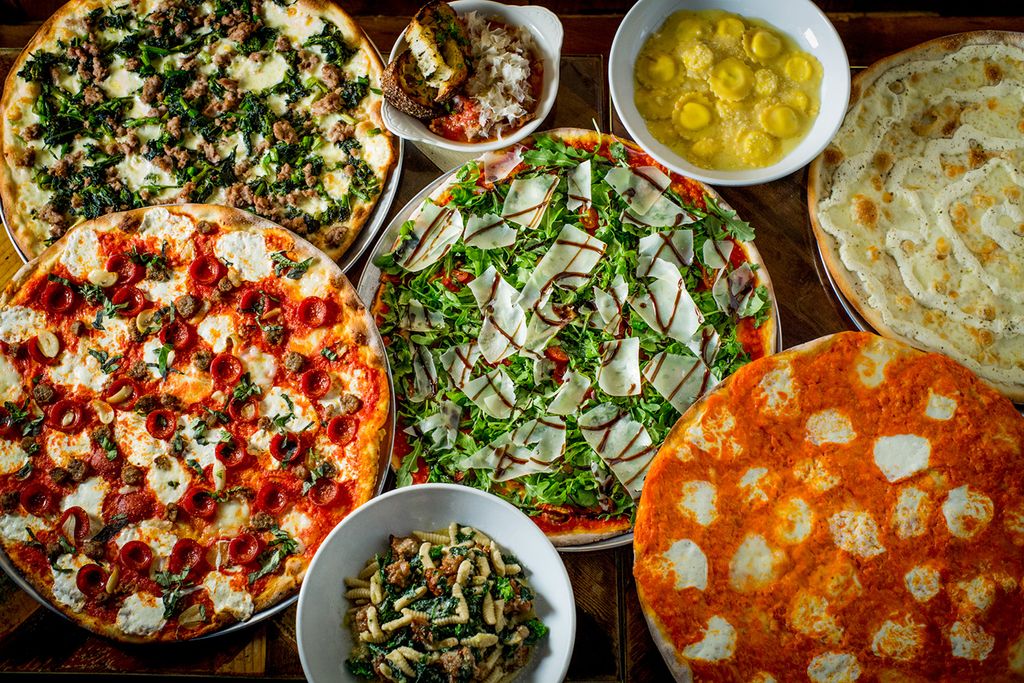 Image may contain Food Pizza Meal Lunch Restaurant Cafeteria Plant Buffet Dinner and Supper