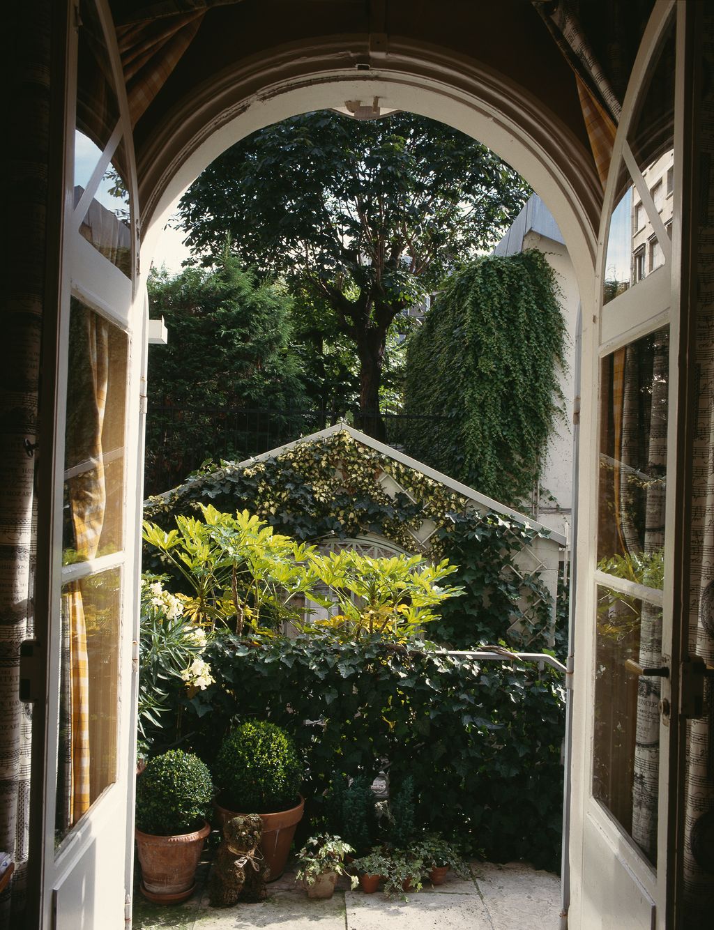 Image may contain Outdoors Garden Arbour Porch and Patio