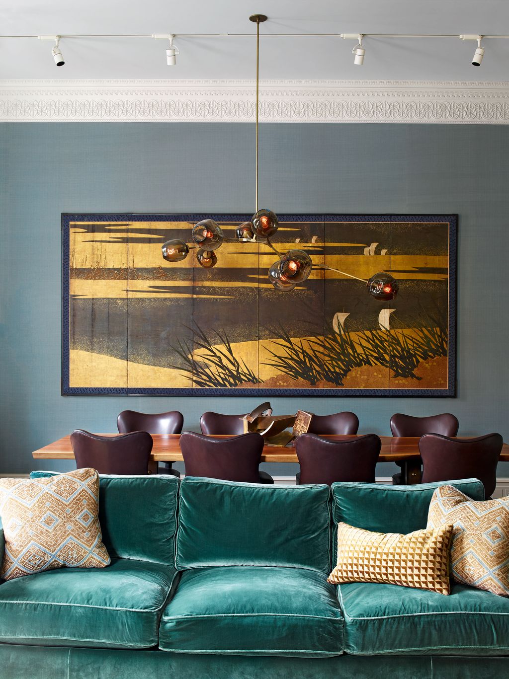 Image may contain Furniture Couch Living Room Room Indoors Chair and Table