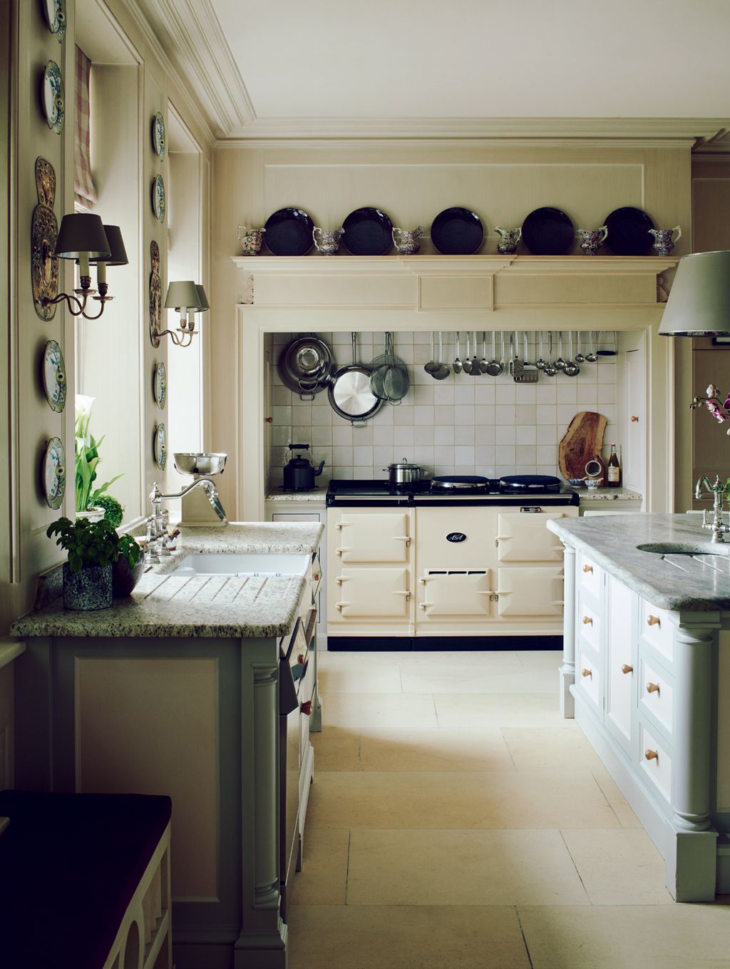 Image may contain Indoors Room Kitchen Kitchen Island and Interior Design