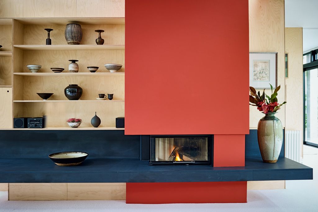 Image may contain Indoors Fireplace Interior Design and Hearth