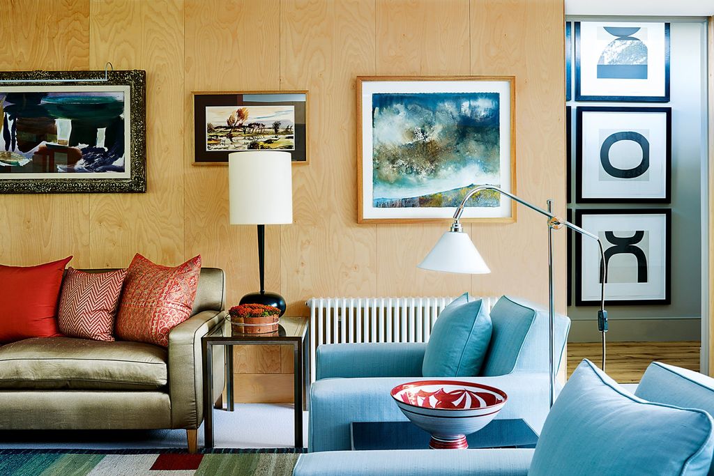 Image may contain Living Room Indoors Room Furniture Couch Table Interior Design Coffee Table Lamp and Table Lamp