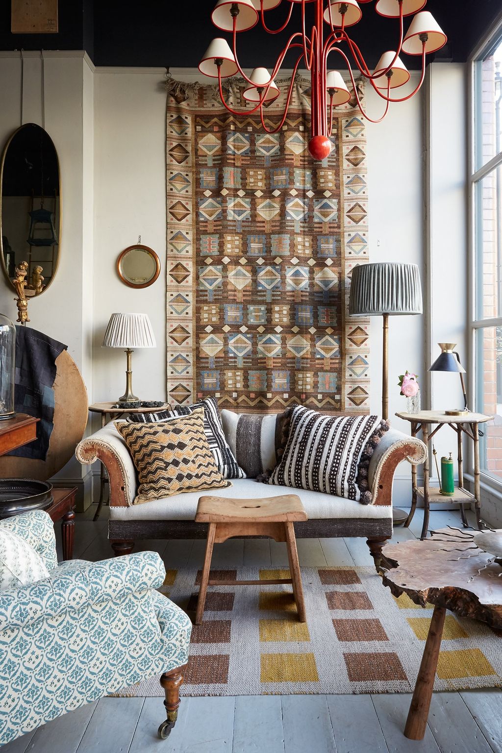 Image may contain Cushion Pillow Furniture Living Room Room Indoors Interior Design Couch Home Decor Rug and Table