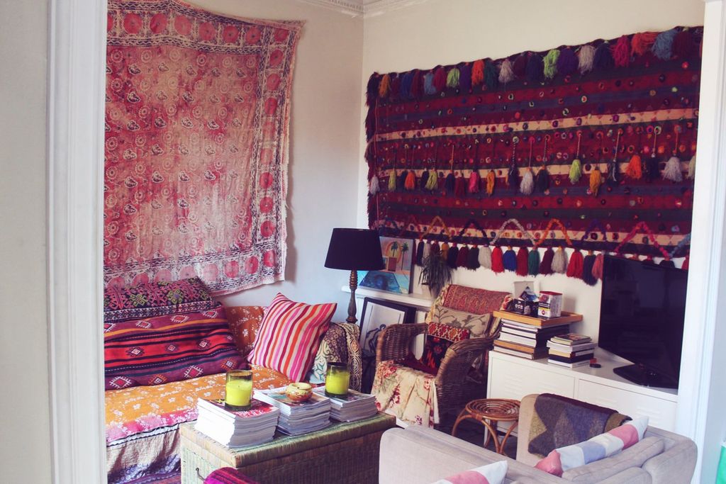 Image may contain Living Room Room Indoors Furniture Couch Cushion and Interior Design