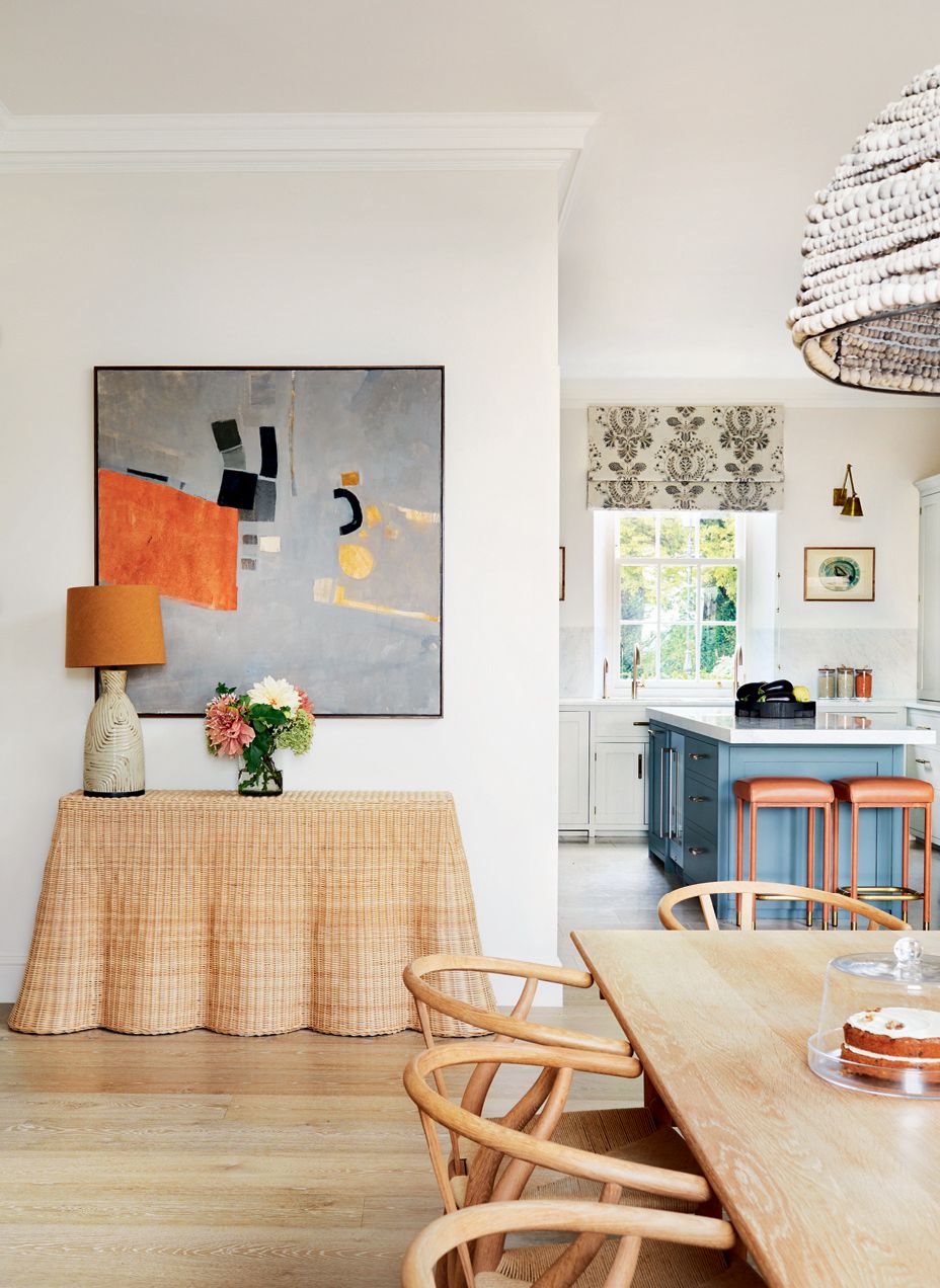 Image may contain Furniture Chair Interior Design Indoors Dining Table Table Room Living Room Lighting and Wood