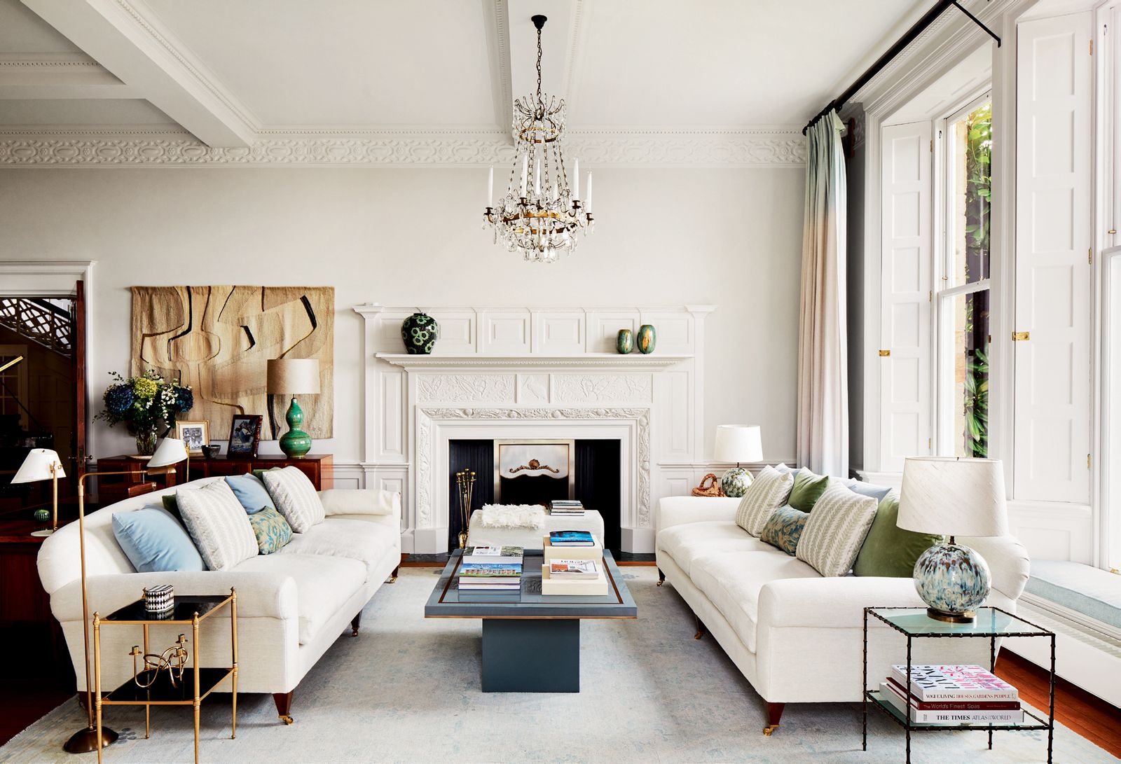 Image may contain Furniture Living Room Room Indoors Table Coffee Table Interior Design Couch Cushion and Pillow