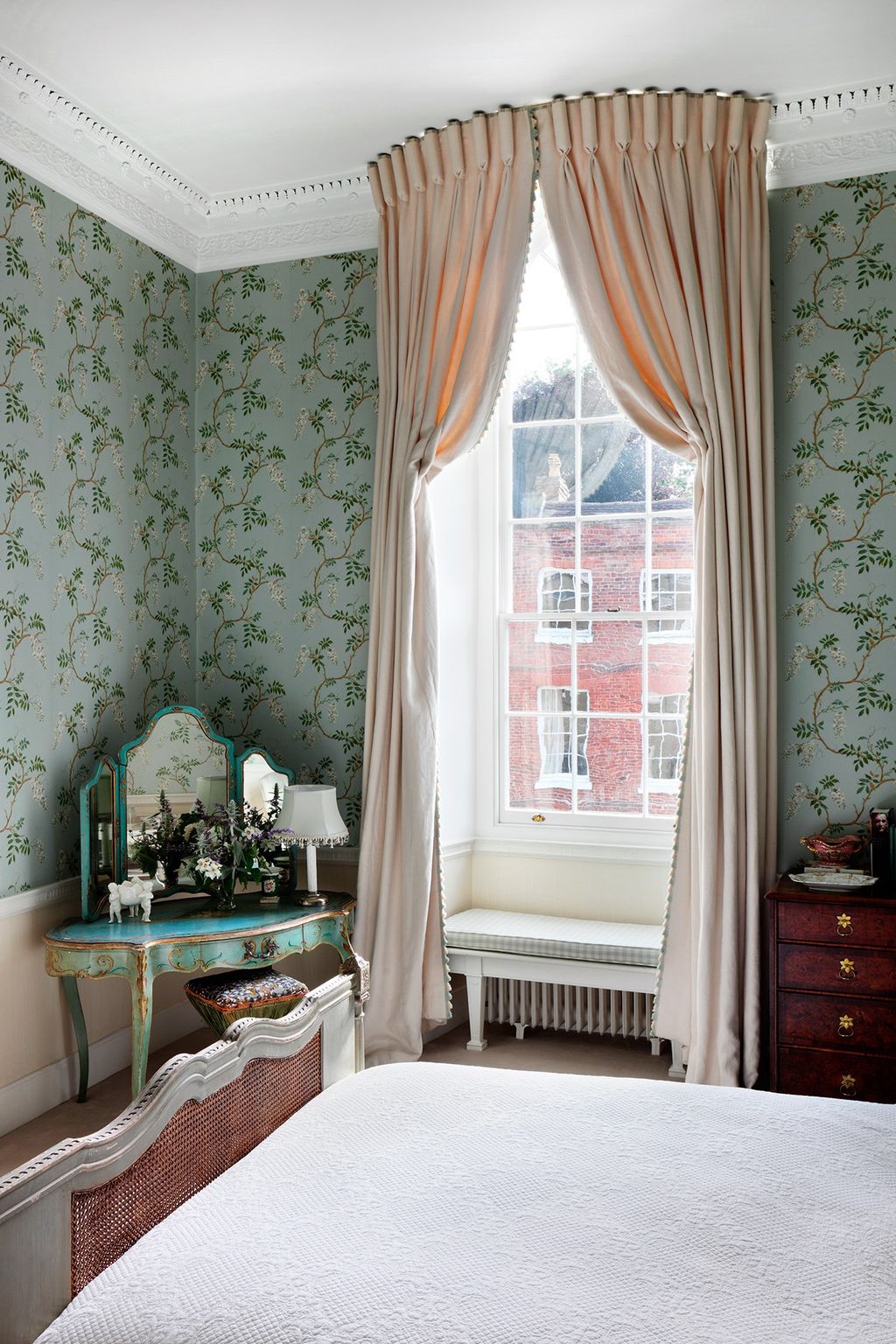 These Italian strung curtains in the bedroom of a Ludlow townhouse designed by Caroline Harrowby have a gobletpleated...