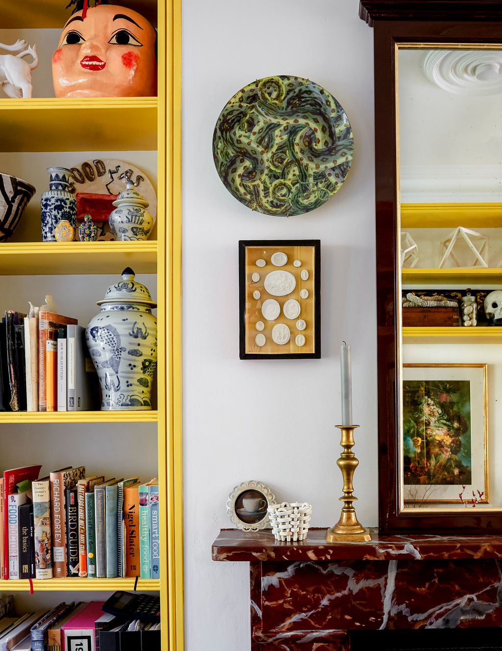 Image may contain Furniture Shelf Bookcase Cupboard and Closet