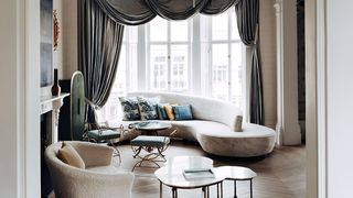 Living room design ideas. Image may contain Furniture Living Room Room Indoors Interior Design Housing Building and Table