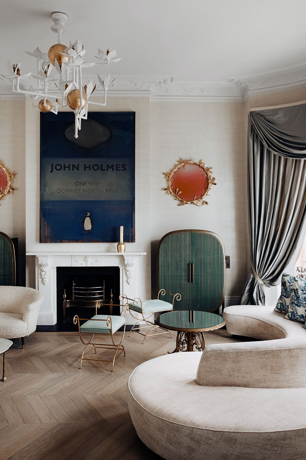 Image may contain Living Room Room Indoors Interior Design Furniture Chair Home Decor Table Couch and Cushion