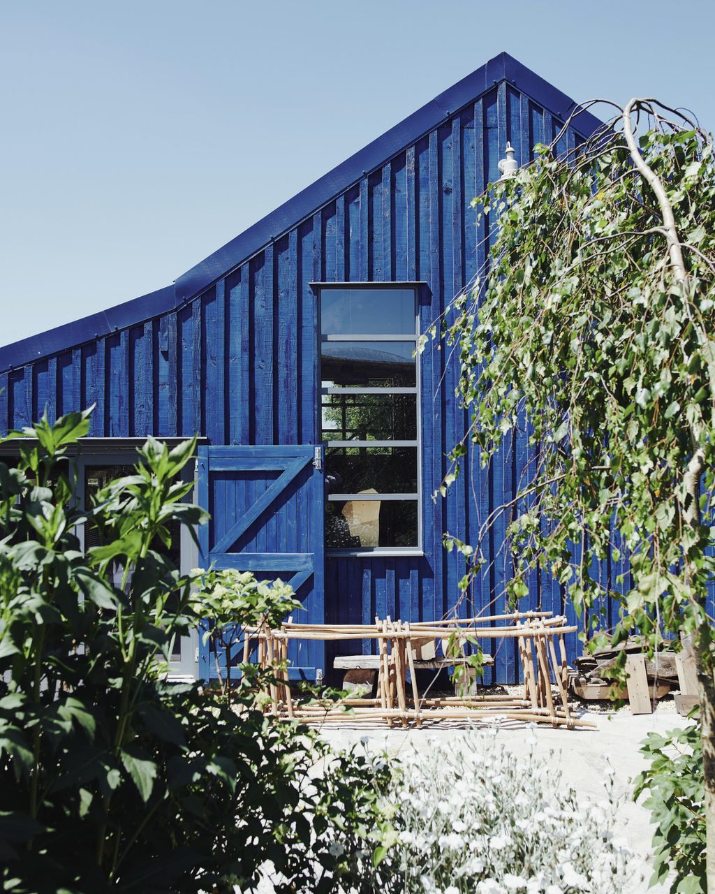 Image may contain Housing Building Outdoors Nature House Cottage Countryside Shelter Rural Cabin and Plant