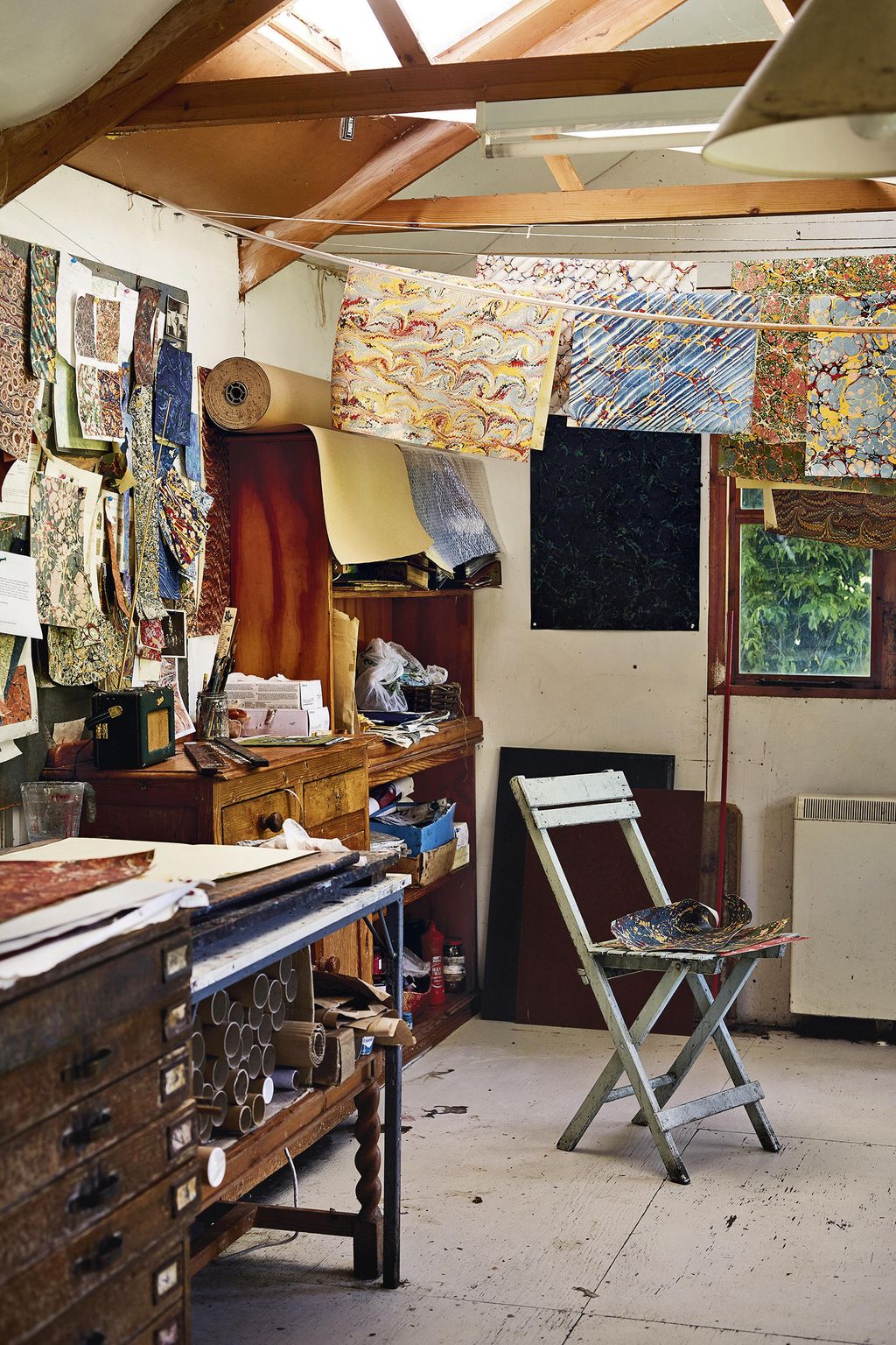 Image may contain Wood Furniture Chair Plywood Clothing Apparel Shelf Canvas and Workshop